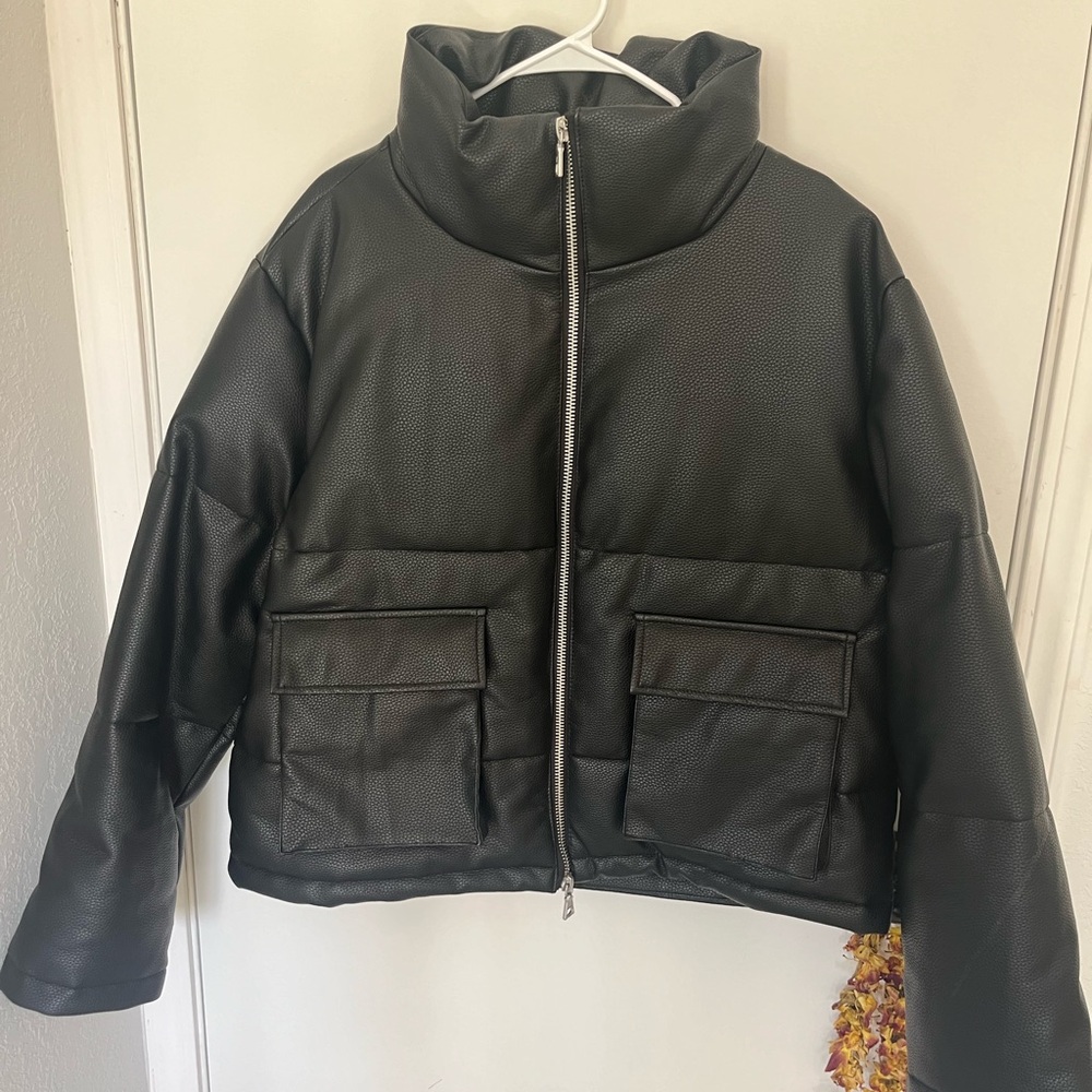 Leather puffer.